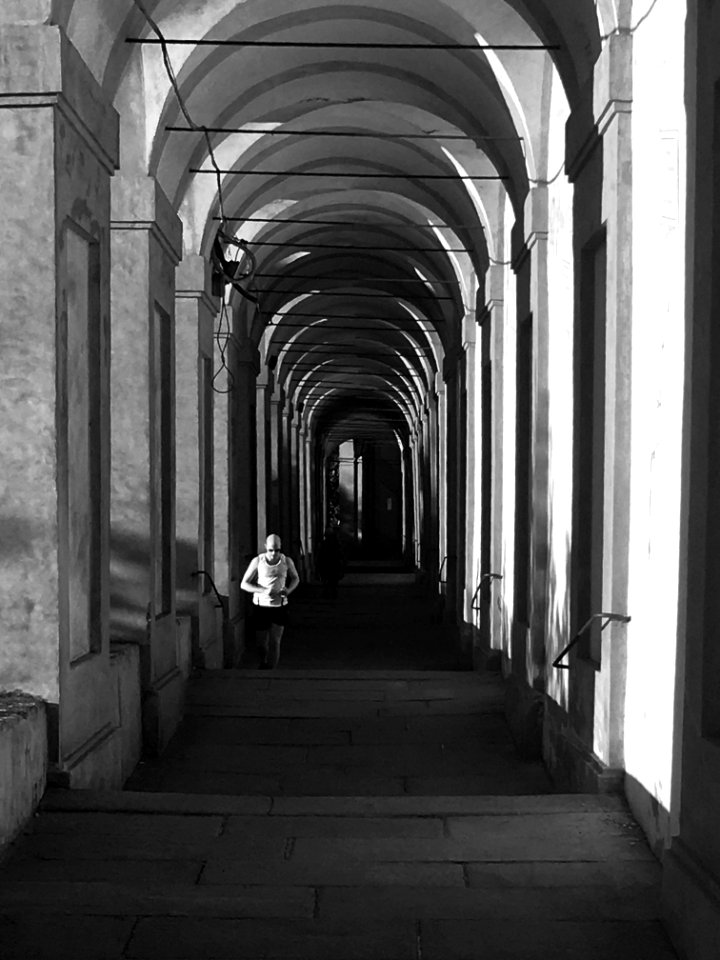 Sport is life, man runing in Bologna, Italy