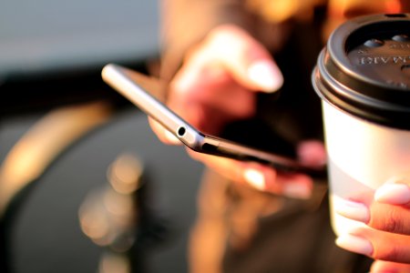 hands-coffee-smartphone-technology photo