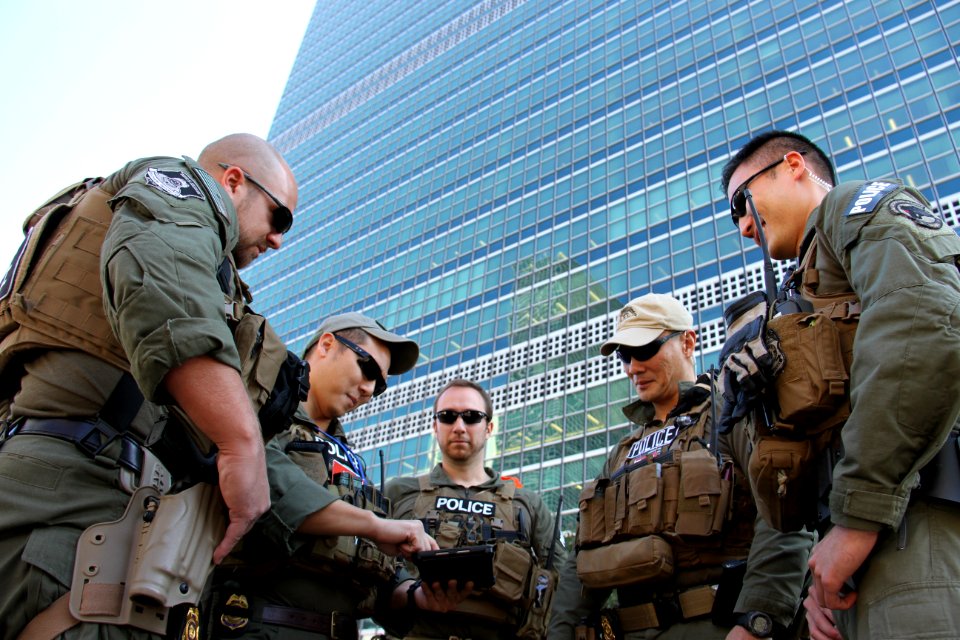 DSS special agents review a satellite image of the United Nations building during the 2014 UN General Assembly, New York, NY.