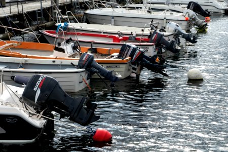 Outboard motors on boats in Norra Hamnen, Lysekil 2 photo