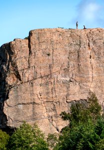 High cliff in Lyse with climbers 3 photo