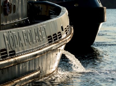 Tugboat Boss discharging ballast water before departure photo