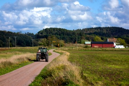 Farm and tractor in Färlev photo