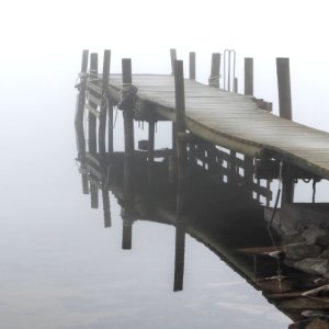 Jetty in fog at Holländaröd 4 photo