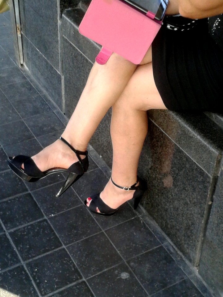 Mature crossed legs
