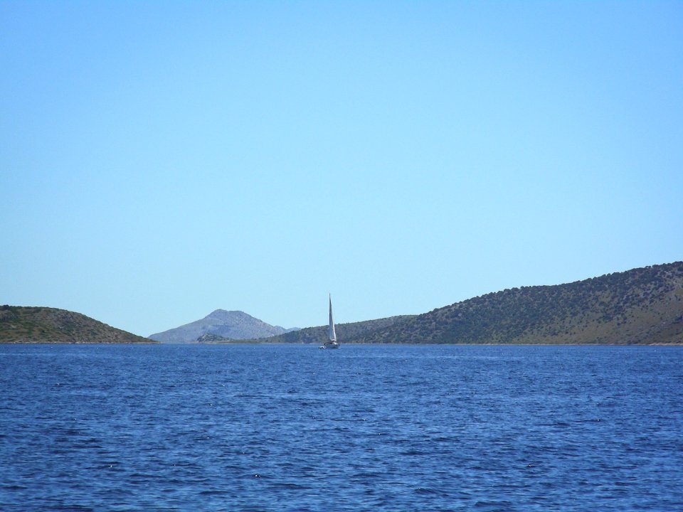 Sailing boat in front of Kornati Islands