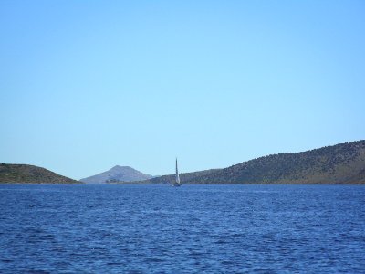 Sailing boat in front of Kornati Islands photo