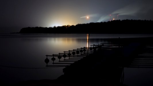 Snowfall at night over Brofjorden and Preemraff oil refinery 2