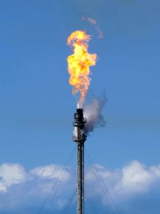 Gas flare on top of a flare stack at Preemraff Lysekil 9 photo