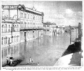 1954, February 19.  East Street, Rockhampton in flood. Cutting from The Morning Bulletin, page 1.