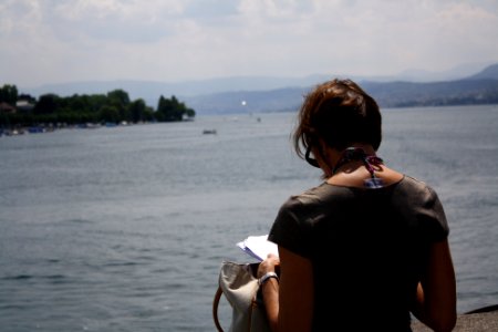 Woman facing Lake Zürich photo