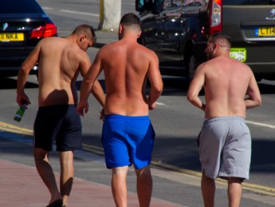 Shirtless Men on Brighton Seafront, Brighton, UK