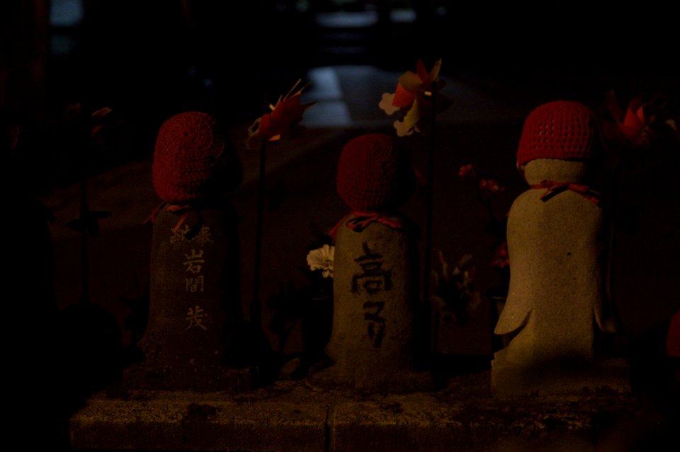 Statues With Bonnets near Tokyo Tower