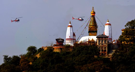 Simrik Air  two Eurocopters AS350 B3e - hovering over Swayambhunath Stupa