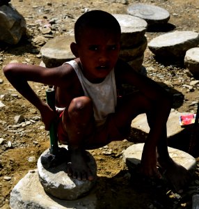 hammer and chisel. Child labor, Kathmandu photo
