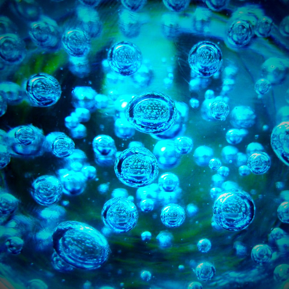 Inside a blue glass paperweight