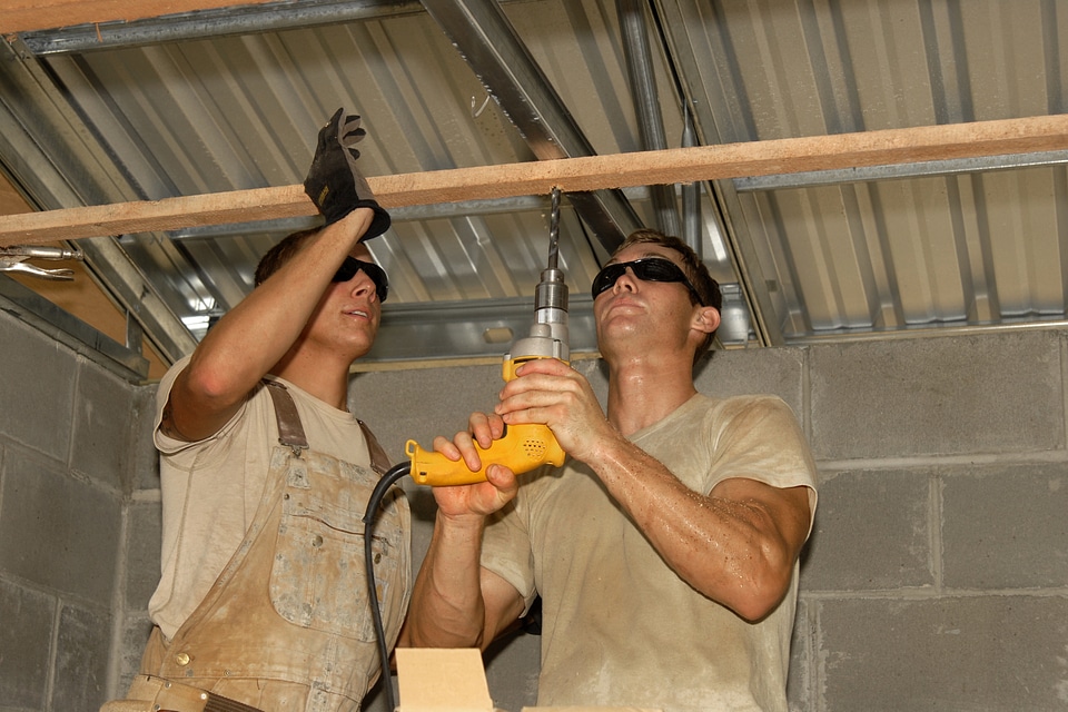 Drilling installing ceiling