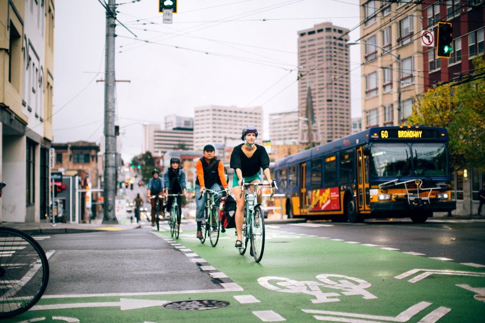 platoon of bikes crossbike bus broadway seattle