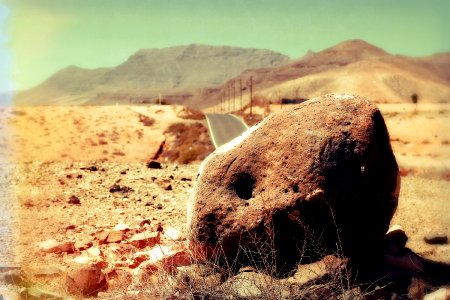 Fuerteventura - red stone in the desert at hot sun photo