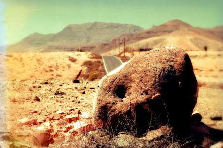 Fuerteventura - red stone in the desert at hot sun