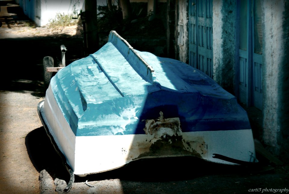 summer in  Playitas  boat in blue.