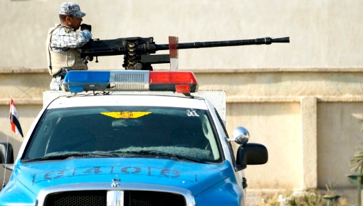An Iraqi National Policeman pulls security at a school in the Al Amtahiya neighborhood in Basra, January 14, 2009. This school will be a voting site for the elections, January 31