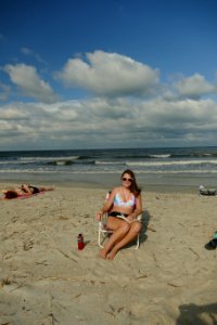 KATIE ON BEACH IN CHAIR-P1790755