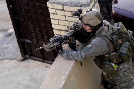 A Ranger with 2nd Bn., 75th Ranger Regiment, provides overwatch security on an objective during a day-time mission in Iraq