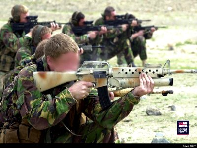 British soldiers from the Brigade Patrol Troop zero their rifles on a range outside Kabul before the start of their operations in Afghanistan, April 2002