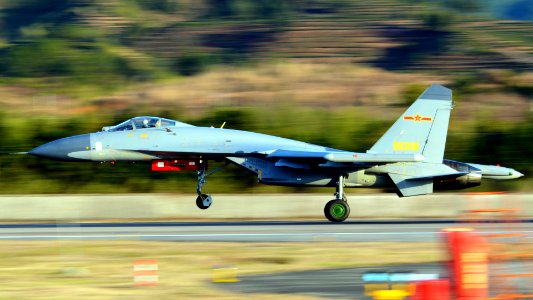 J-11 Fighter Aircraft Taking Off photo