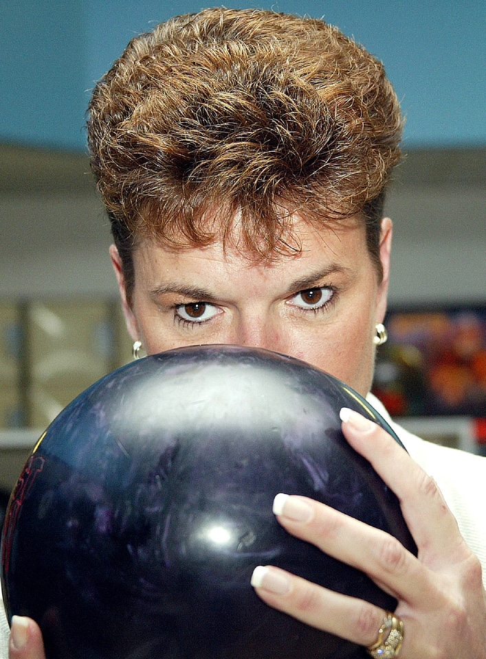 Female ball bowling