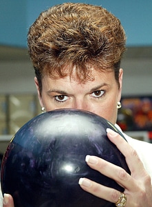 Female ball bowling