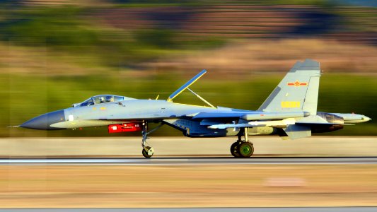 J-11 Fighter Aircraft Taking Off photo