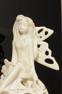 Sculpture woman angel face