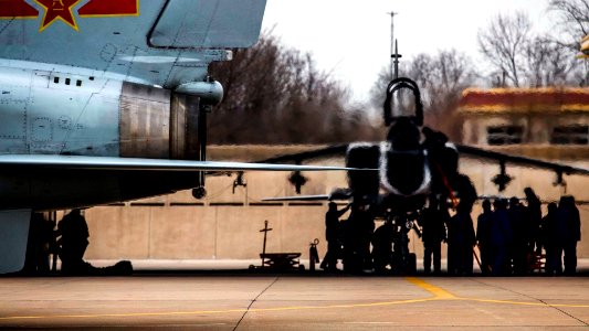 JH-7 Fighter Bomber Being Serviced