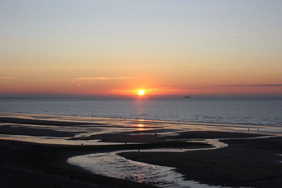 Landscape was normandy beach sunset