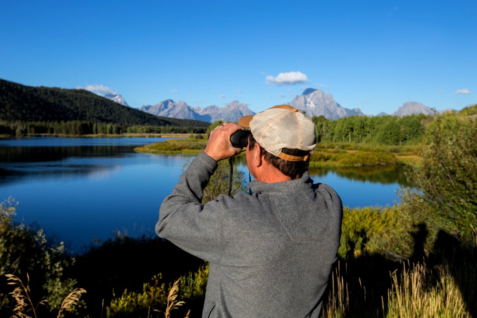 Bird watcher at Oxbow Bend