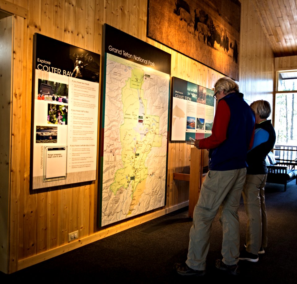 Visitors at map, Colter Bay Visitor Center