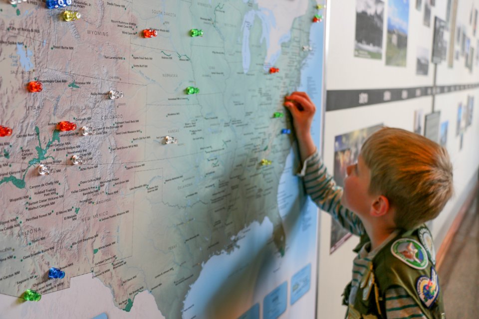 Junior Ranger exploring a map