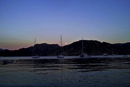 Moonrise just after sunset in Mediterranean photo