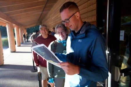Visitors reading the eclipse guide