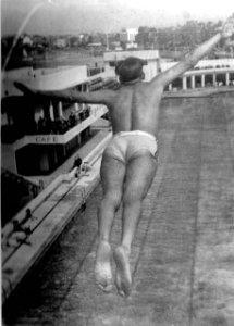 1950-leaving-the-diving-board-of-the-super-swimming-stadium photo