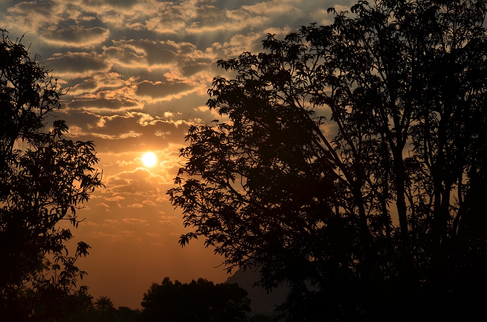 Sunlight clouds silhouettes