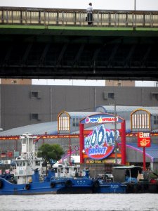 wOOw CIRCUIT neon sign and 2 blue boats photo