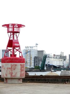 red buoy and green drawbridge photo