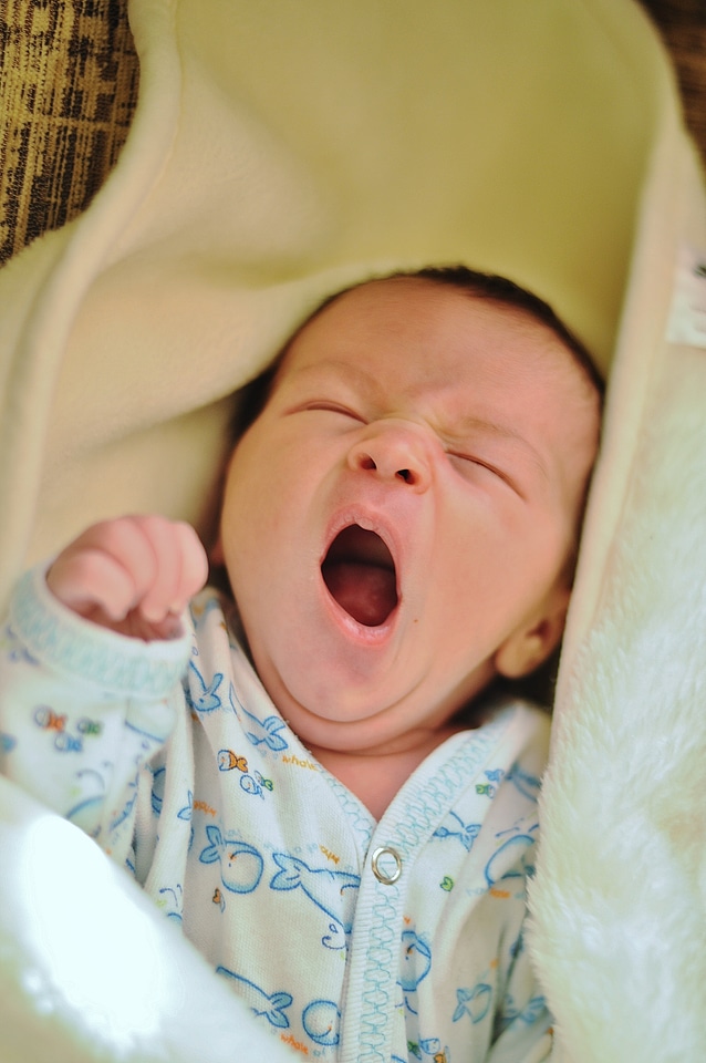 Little infant yawn