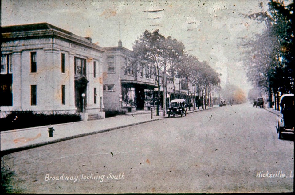 Old Hicksville NY  East side of Broadway looking South, Bank of Hicksville on left. RR tracks behind the photographer.