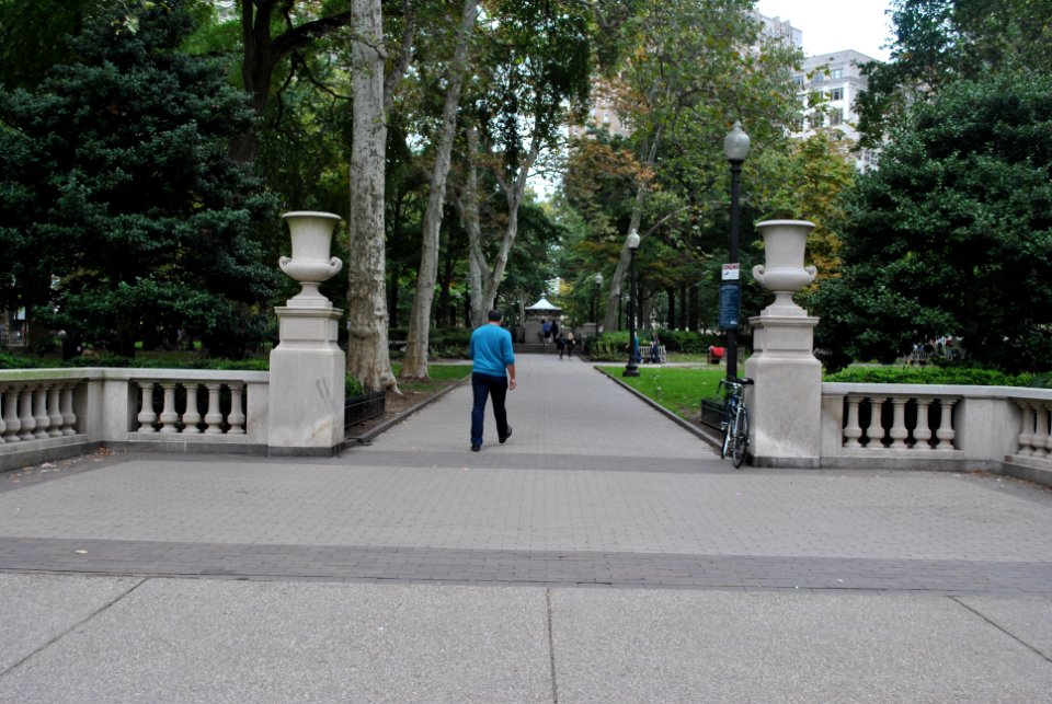 city park man walking photo