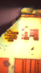 Marvell 88i6540-LFH1 HDD controller - top metal - die markings (chipped corner) - stacked