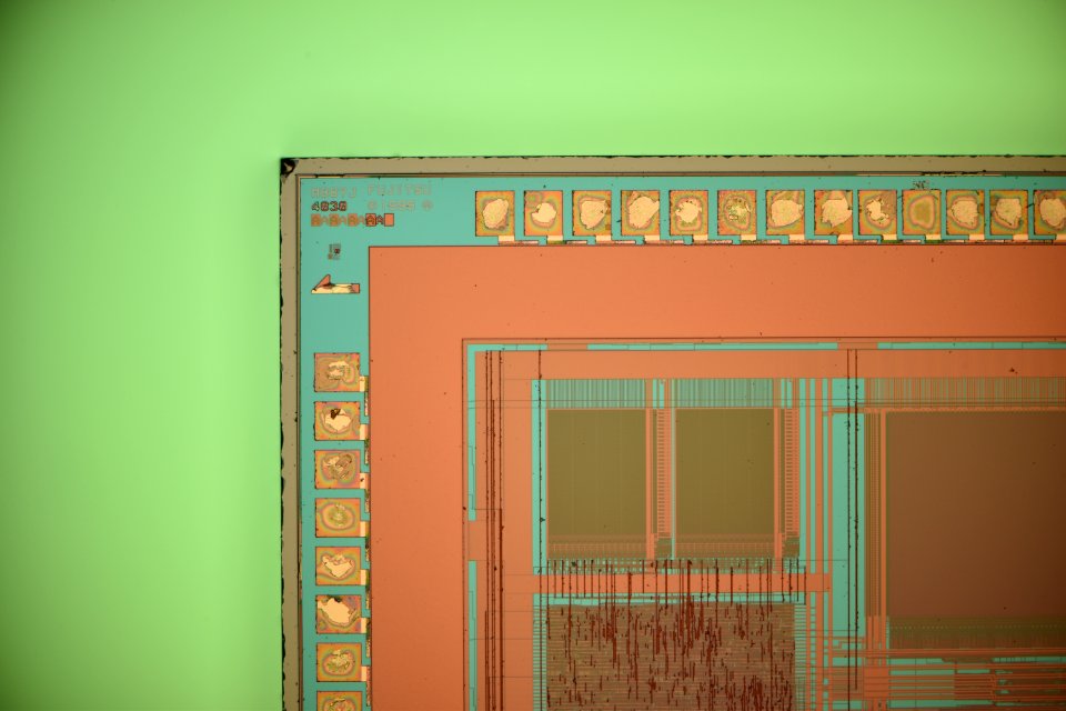 Fujitsu MB87J4030 die shot - top metal - markings